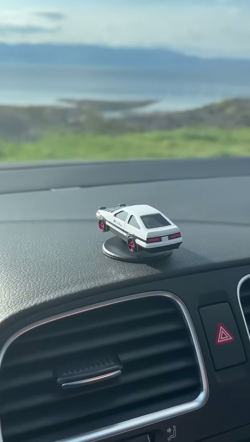 Voiture qui drift sur tableau de bord